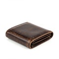 A brown leather wallet with a weathered texture, featuring multiple folds and stitching Royalty Free Stock Photo