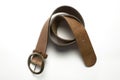 Brown leather woman`s belt closeup on a white background Royalty Free Stock Photo