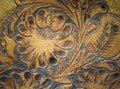 Brown leatherwork carved detail on saddle. Royalty Free Stock Photo