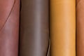 Brown and light brown leather rolls. Can be used as background in art or design projects. Royalty Free Stock Photo