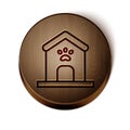 Brown line Dog house and paw print pet icon isolated on white background. Dog kennel. Wooden circle button. Vector Royalty Free Stock Photo