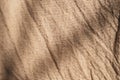 Brown linen canvas. The background image, creases texture background Royalty Free Stock Photo