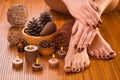 Brown manicure and pedicure on the white Royalty Free Stock Photo