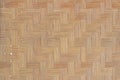 Brown Mat Traditional handicraft bamboo weave texture background Royalty Free Stock Photo