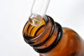 Brown medical bottle and a pipette Royalty Free Stock Photo