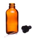 Brown medicine glass bottle with dropper isolated Royalty Free Stock Photo