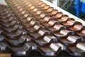 Brown metal roof tiles made from galvanized and painted steel Royalty Free Stock Photo