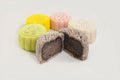 Brown mini snow skin mooncake with chocolate filling & assortment of other contemporary recipes on white background