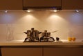 Brown modern gloss kitchen - detail cooking area Royalty Free Stock Photo