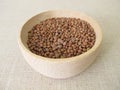 Brown mountain lentils in a bowl Royalty Free Stock Photo