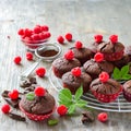 Brown muffins with raspberries square image