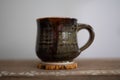 Brown Mug on Coaster Royalty Free Stock Photo