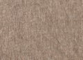 Brown natural simple coarse linen fabric - canvas. Brown burlap fabric background texture. Royalty Free Stock Photo