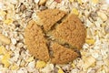 Brown oatmeal cookies, on oatmeal in a close-up view from above Royalty Free Stock Photo