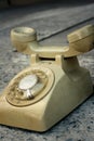 Brown old phone vintage style on a floor. Royalty Free Stock Photo