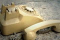 Brown old phone vintage style on a floor. Royalty Free Stock Photo