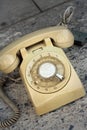 Brown old phone vintage style on a floor. Royalty Free Stock Photo