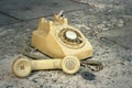 Brown old phone vintage style on a floor. Royalty Free Stock Photo