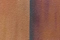 Brown orange plaster wall two colors abstract pattern design stucco background texture empty blank space Royalty Free Stock Photo