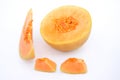 The brown orenge colour muskmelon half and cutt piece isolated in white background Royalty Free Stock Photo