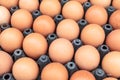 Brown organic eggs on a market