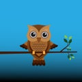 Brown owl on a branch