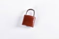 Brown padlock on white background. Royalty Free Stock Photo