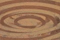 Brown paint concentric ellipses