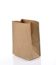 Brown Paper Bag Lunch with Copy Space Isolated on White Background. Royalty Free Stock Photo