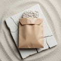 A brown paper bag placed on a cracked white rectangular surface Royalty Free Stock Photo