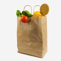 Brown paper bag with vegetables. Recycled pack with fresh organic food isolated on white background