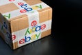 Brown paper box eBay packaging delivered with security scotch tape to safe and protect for international shipping program. Royalty Free Stock Photo