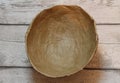 Brown paper crafting making papermache bowl