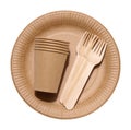 Brown paper cups, wooden fork and plates on a white background. Recyclable garbage, rejection of plastic, top view Royalty Free Stock Photo