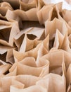 Brown paper disposable bags in the pile