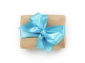 Brown paper gift box with blue ribbon bow top view Royalty Free Stock Photo