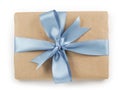 Brown paper gift box with blue ribbon bow top view Royalty Free Stock Photo