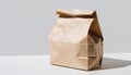Brown Paper Lunch Bag on White Surface Royalty Free Stock Photo