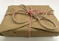 Brown paper package tied with string Royalty Free Stock Photo