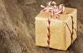 Brown paper package tied up with strings Royalty Free Stock Photo