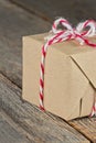 Brown paper package tied up with strings Royalty Free Stock Photo