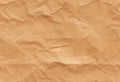 Brown paper seamless texture background with crumpled effect for eco friendly product packaging or illustration. AI generated Royalty Free Stock Photo