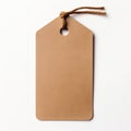 A brown paper tag mockup hanging from a string. Royalty Free Stock Photo