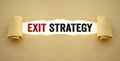 Brown paper work with written words exit strategy Royalty Free Stock Photo