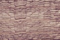 Brown pattern of decorative brown grey slate stone wall surface Royalty Free Stock Photo