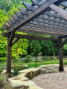 Brown pergola patio structure with string of lights Royalty Free Stock Photo