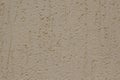 Brown plastered handmade rough wallpaper. Beautiful decorative gray plastered wall. Royalty Free Stock Photo