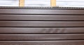 Brown plastic siding Royalty Free Stock Photo