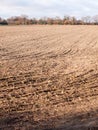 Brown ploughed dry autumn farm field space tracks empty space ag