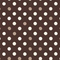 Brown polka dot pattern with cream and beige circles on dark background Royalty Free Stock Photo
